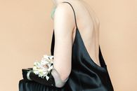 Woman in Black Spaghetti Strap Dress