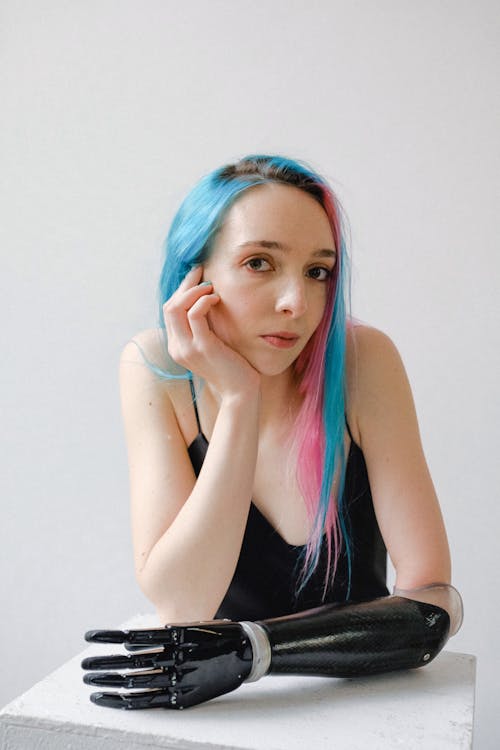 Woman in Black Tank Top With Blue and Pink Hair