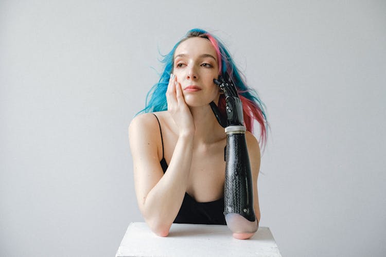 Portrait Of Woman With Prosthetic Arm