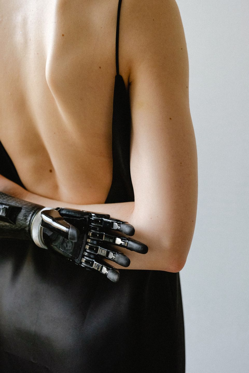 Person using a prosthetic arm