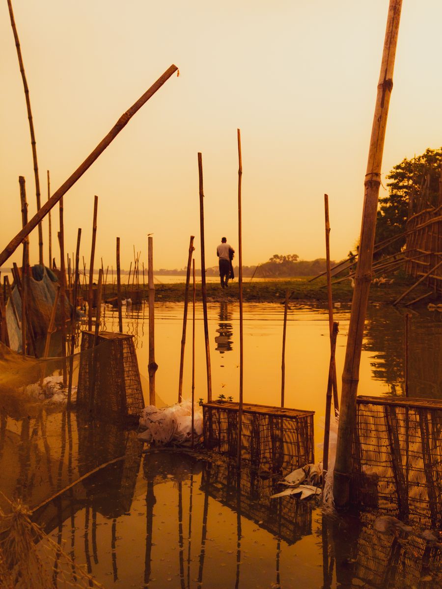 Serene river life in Khulna at sunset