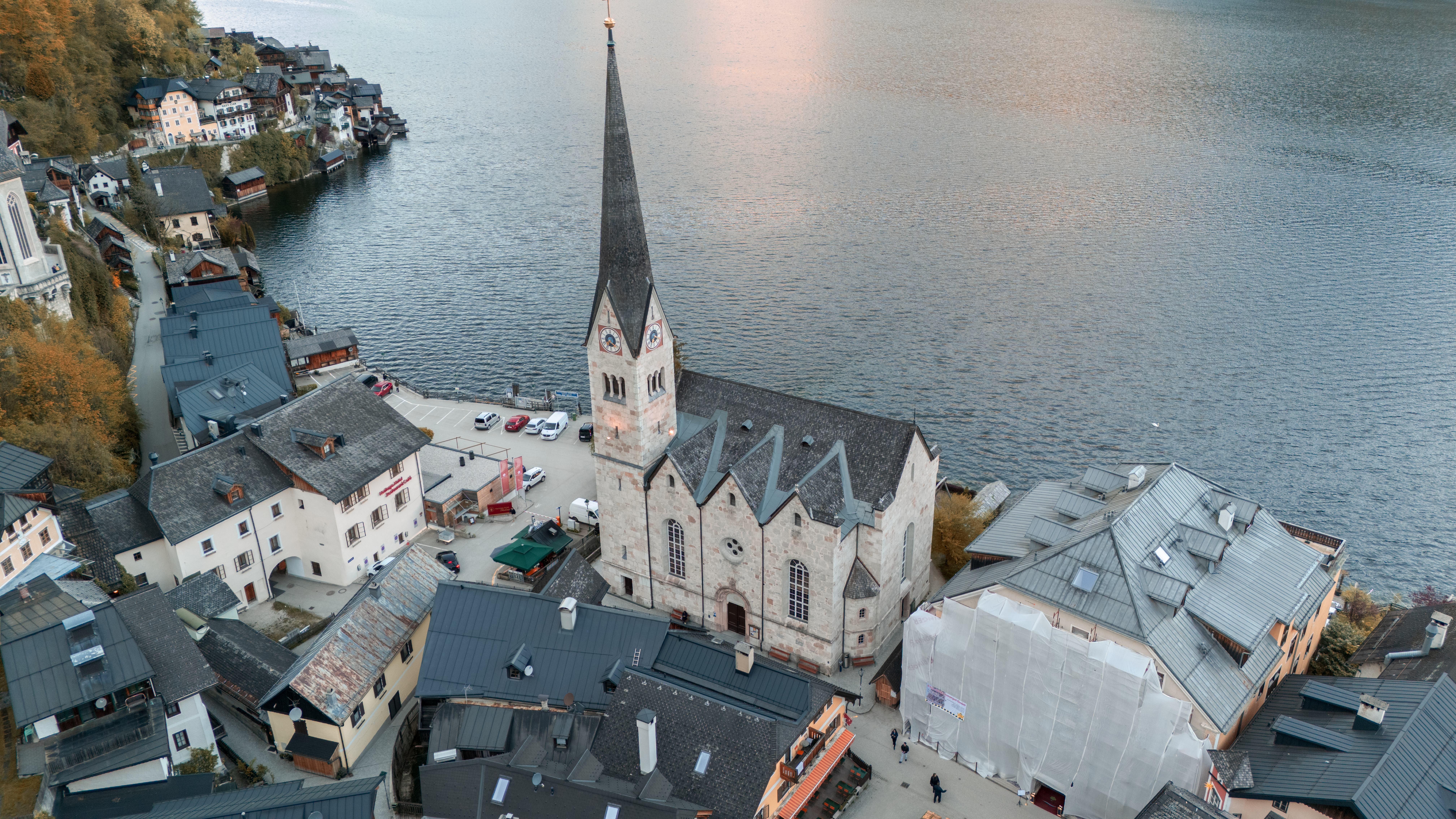 Aerial View of Hallstatt's Iconic Church and Lake · Free Stock Photo