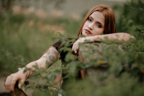 Relaxed woman in green park