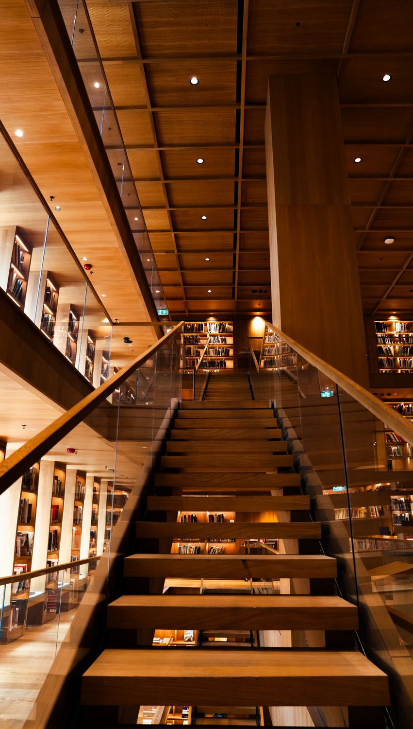 Library Ramp Inside Modern Library Interior with Wooden Staircase · Free Stock Photo