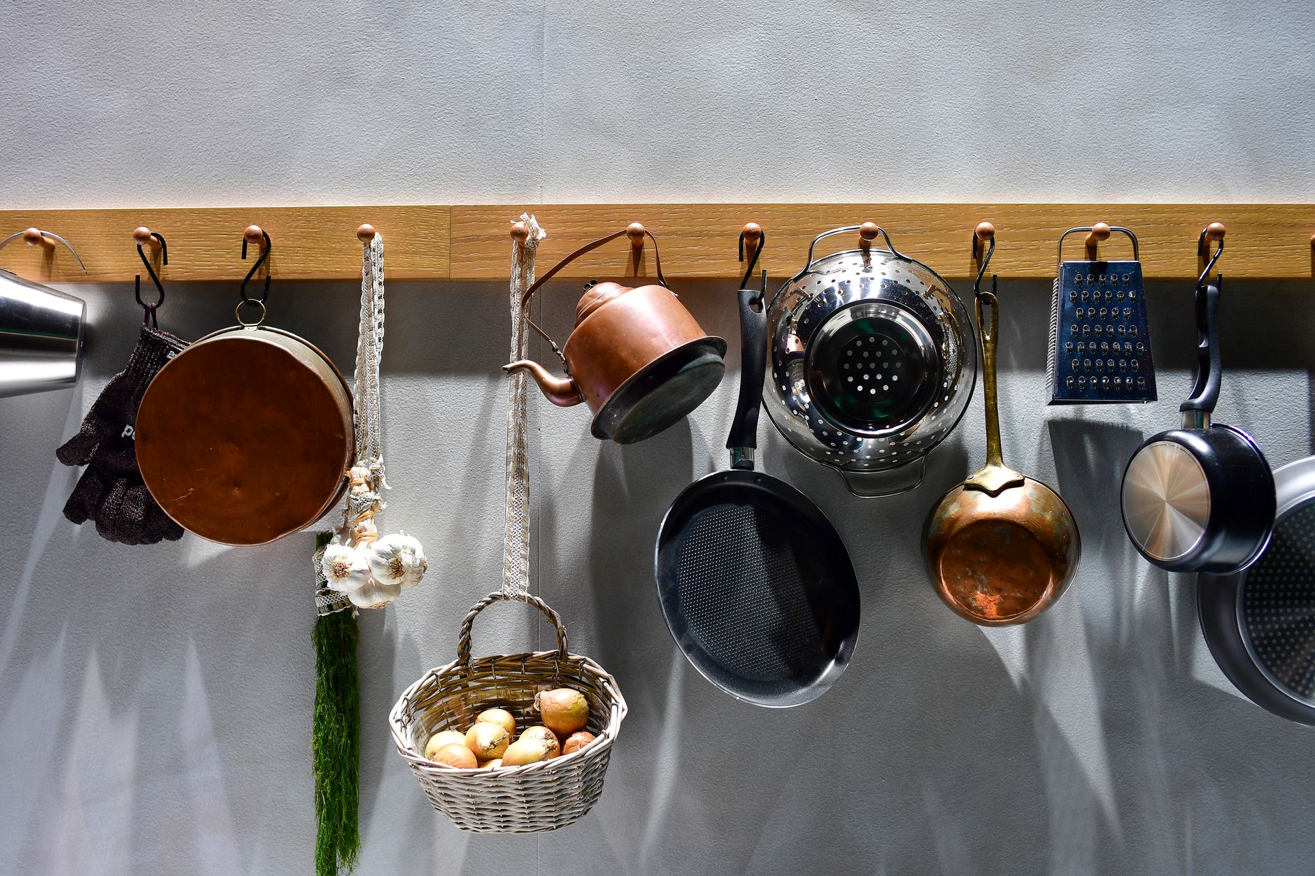 Clean copper cookware with lined interior in modern kitchen