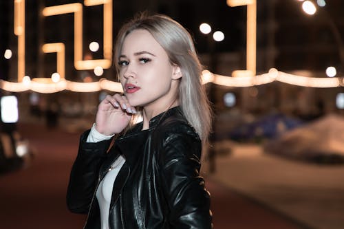 Woman with Blond Hair Wearing Black Leather Jacket