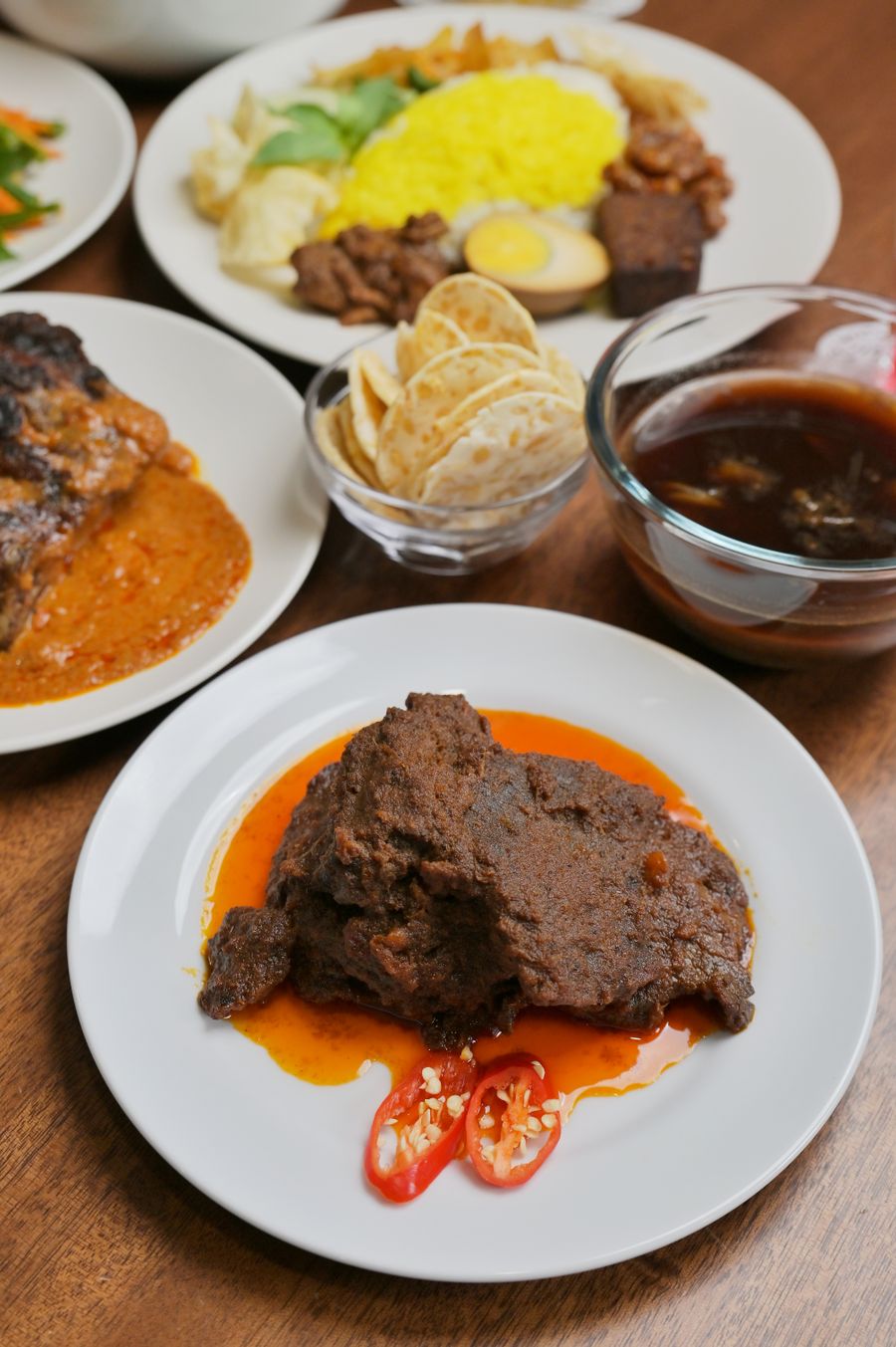 Authentic Nasi Padang with beef rendang and a variety of side dishes