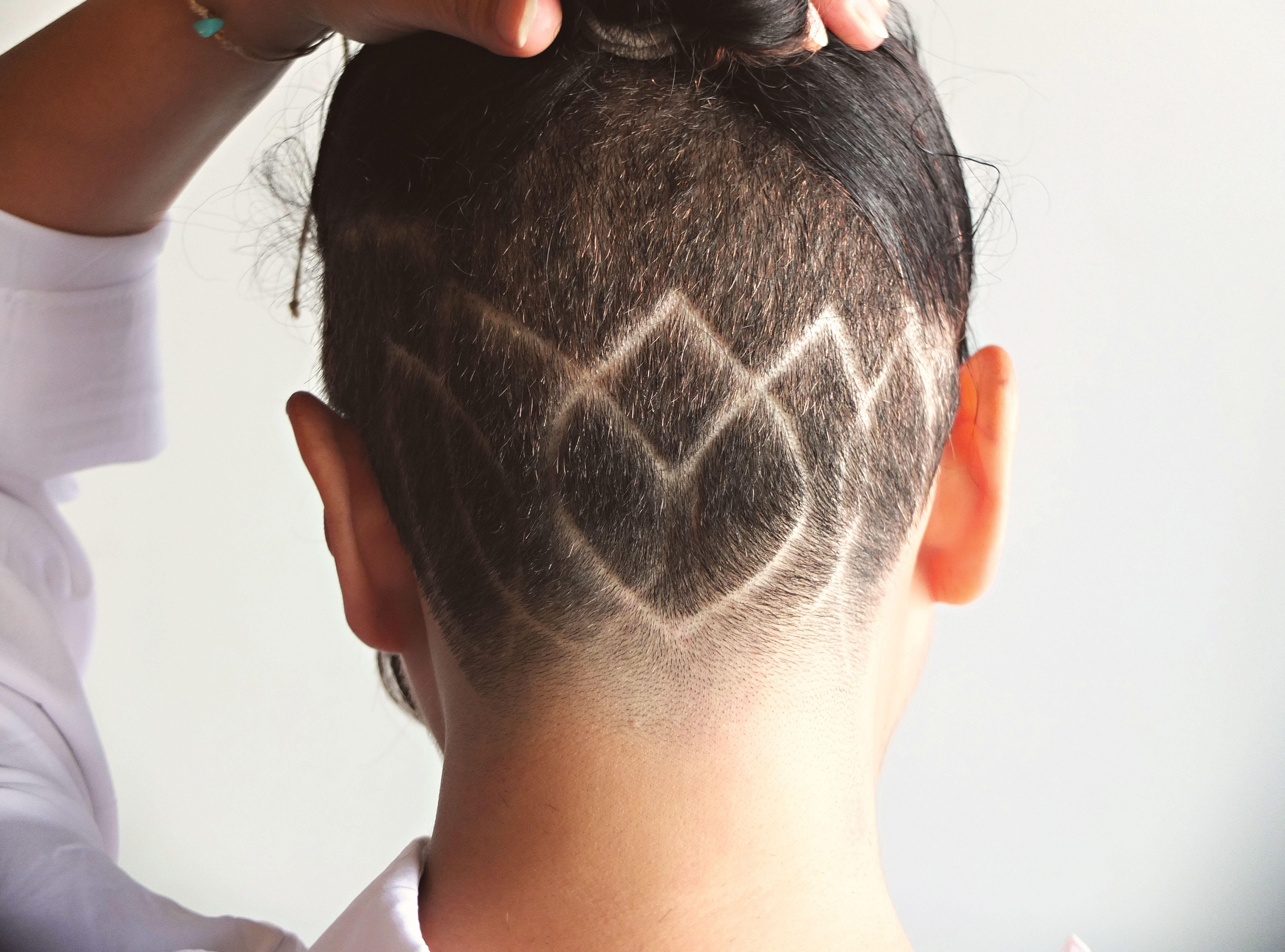Creative Hair Design with Undercut Patterns · Free Stock Photo