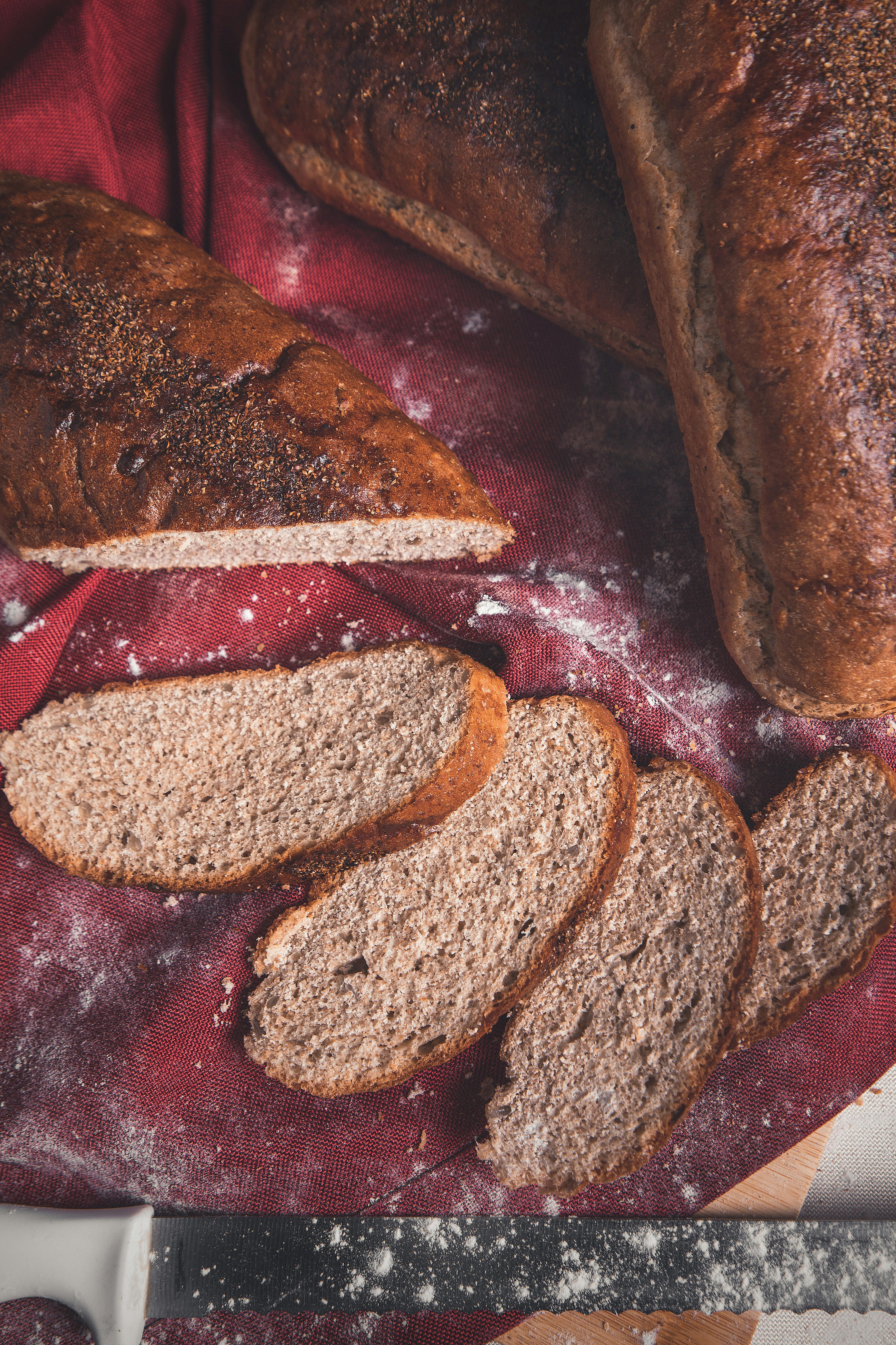 sliced brown bread on red tray