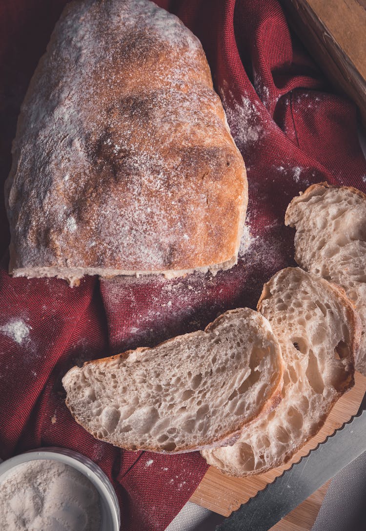 Delicious Bread On Table In Kitchen