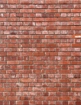 A detailed view of a textured red brick wall, perfect for backgrounds and designs.