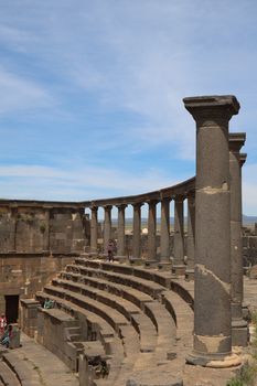 Explore the impressive ancient Roman amphitheater ruins in Bosra, Syria.