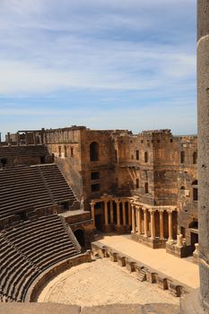 Explore the historic Roman amphitheater in Bosra, Syria, showcasing classical architecture and rich cultural heritage.