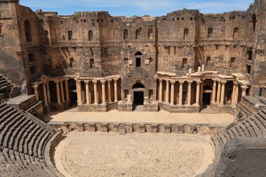 Stunning view of the Ancient Roman Amphitheater located in Bosra, Syria, a UNESCO World Heritage Site.
