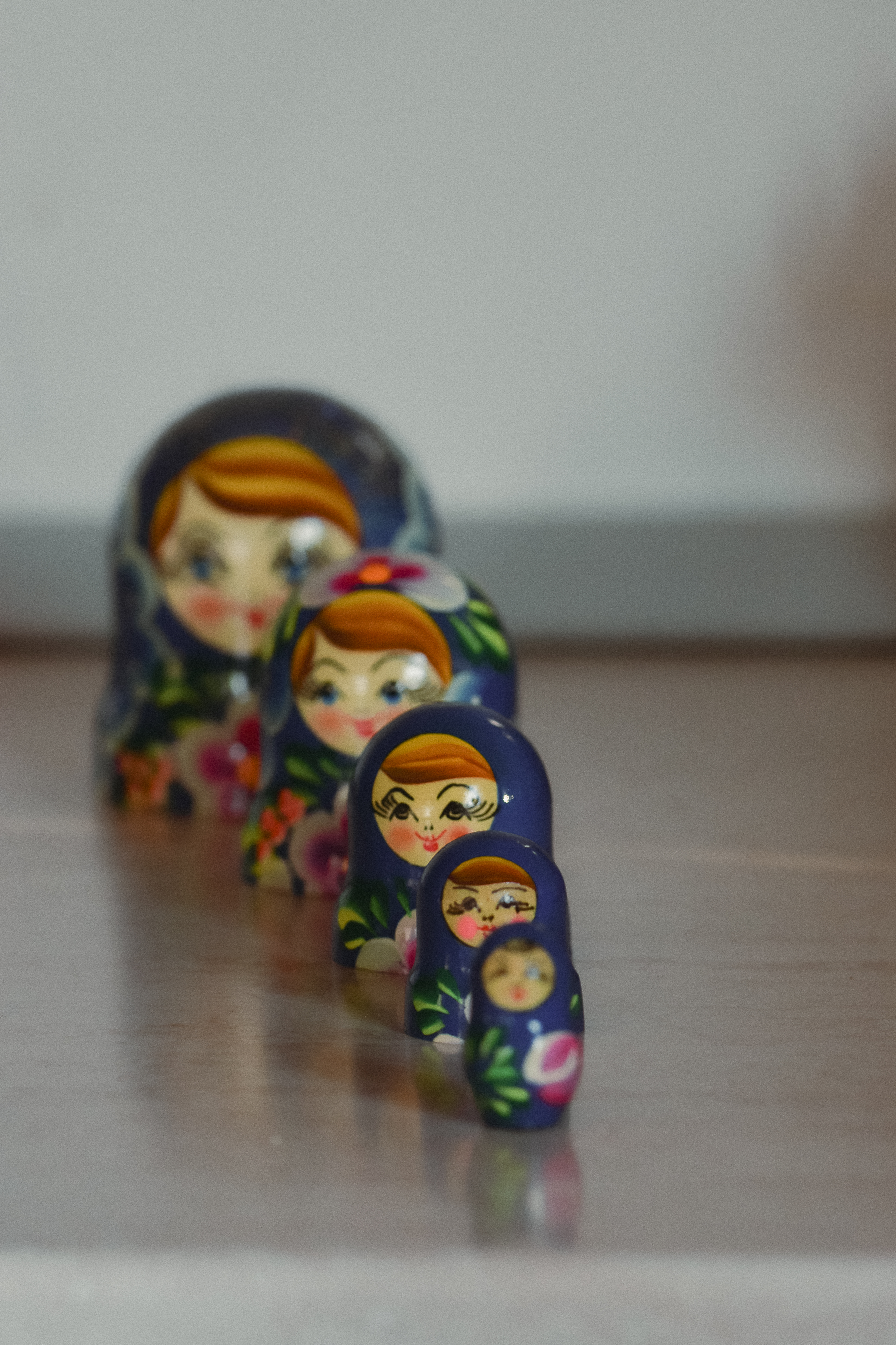 Vibrant Russian nesting dolls, a classic cultural icon, in a line.