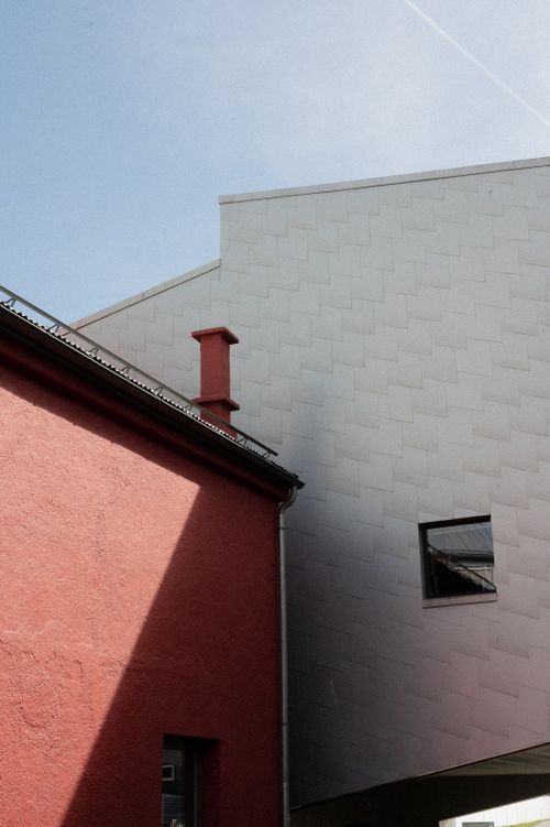 Free A striking view of red and white building facades in Porsgrunn, Norway. Stock Photo