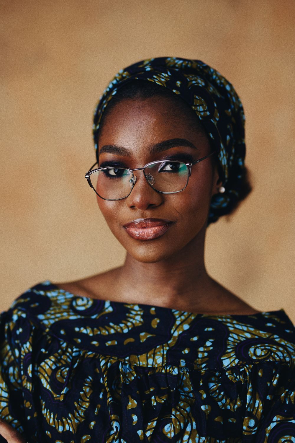 Elegant Portrait of a Woman with Glasses · Free Stock Photo