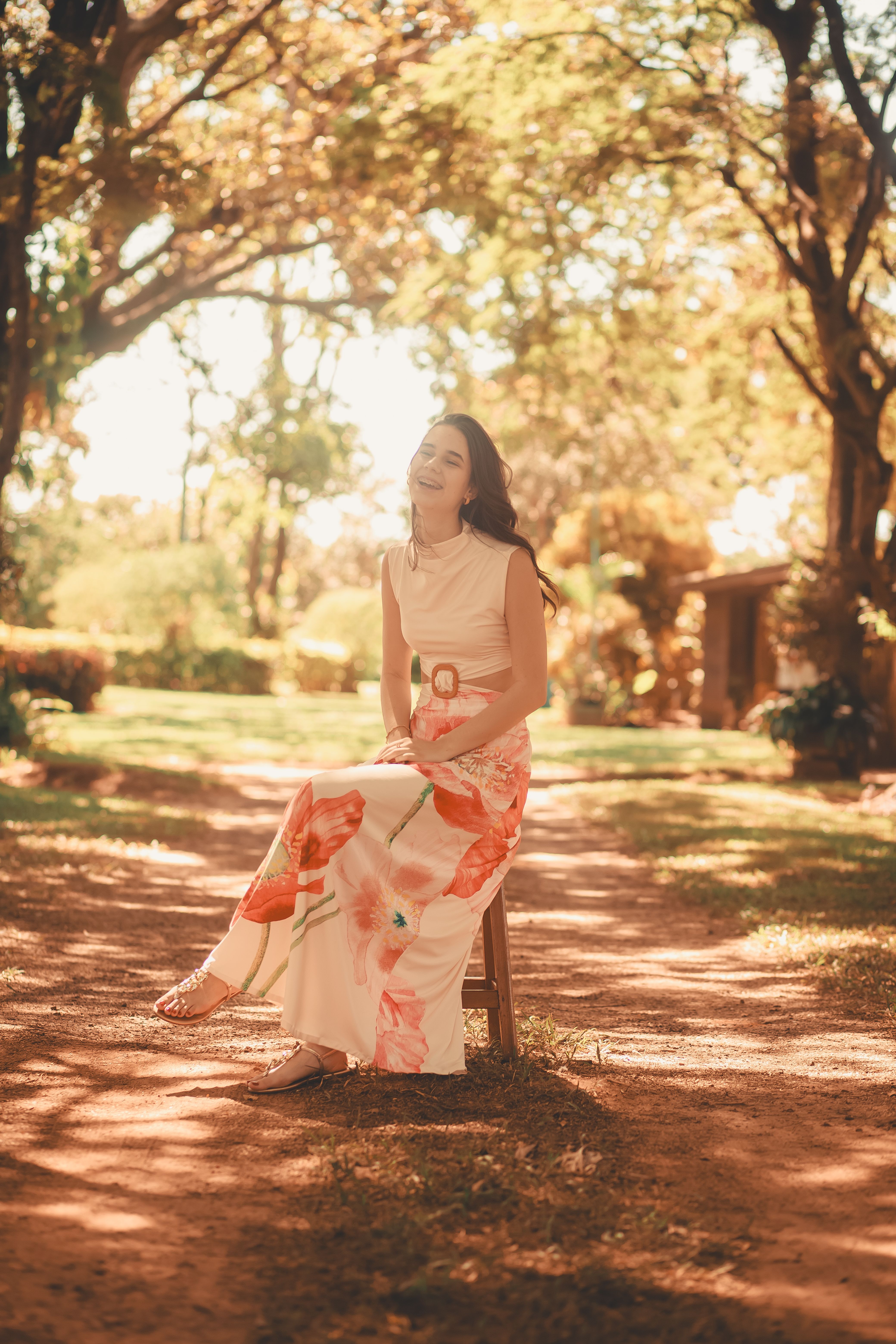 Young Woman Relaxing in Sunny Garden · Free Stock Photo