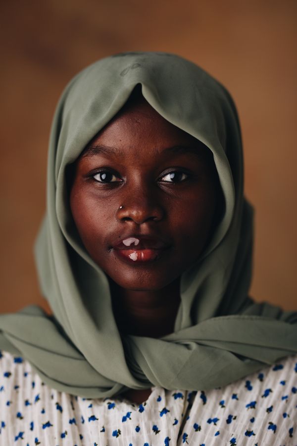 Portrait of a Woman in Yellow Hijab · Free Stock Photo