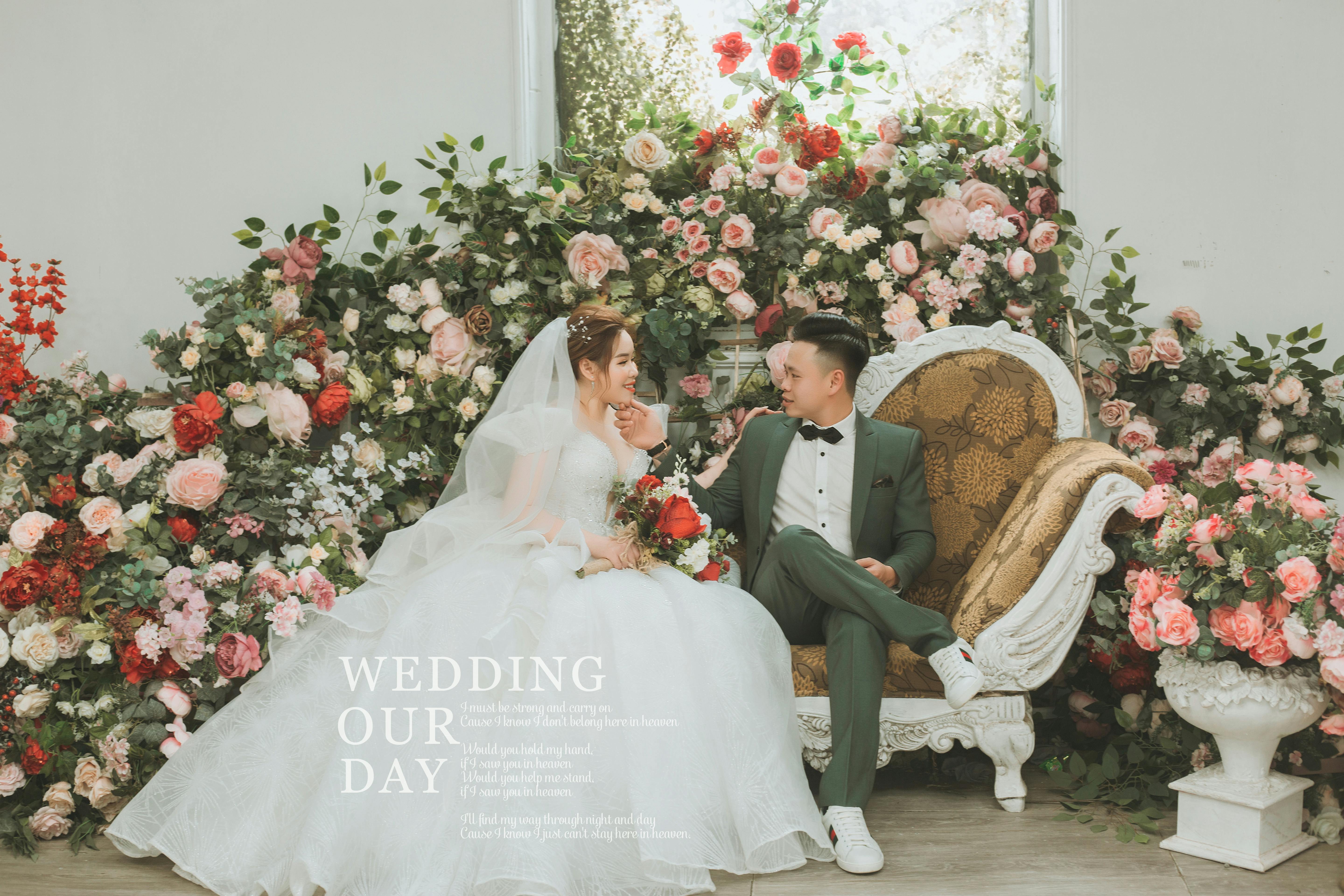 Group of scientists discussing data on a laptop aboard a research vessel