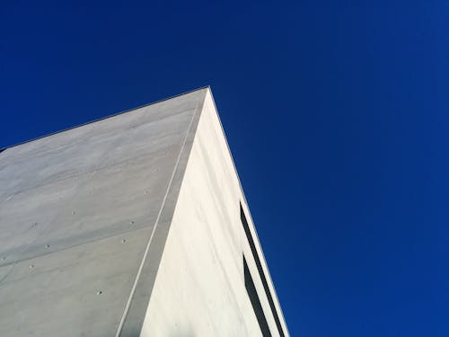 Gratis arkivbilde med betong, blå himmel, hus