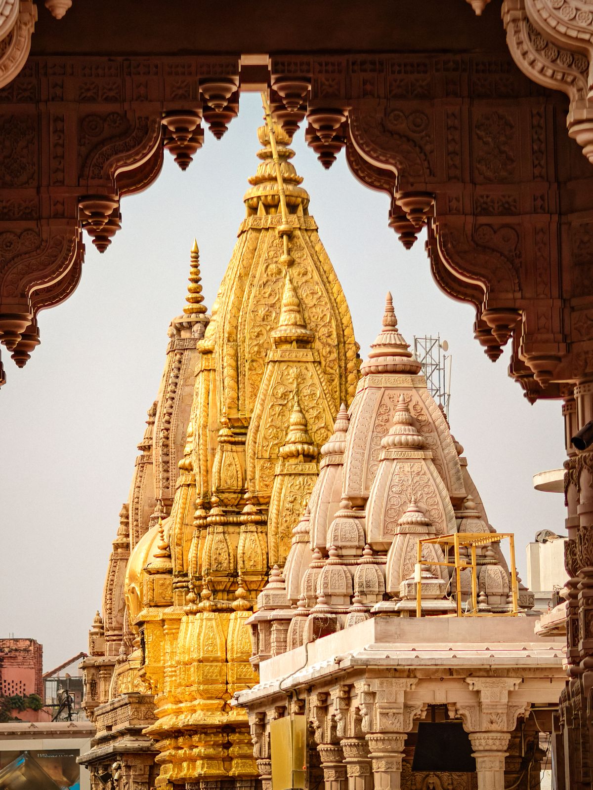 A group of buildings with yellow umbrellas on top of them
