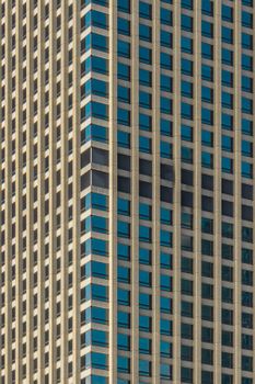 Close-up of a modern skyscraper's geometric facade in Sydney's downtown area.