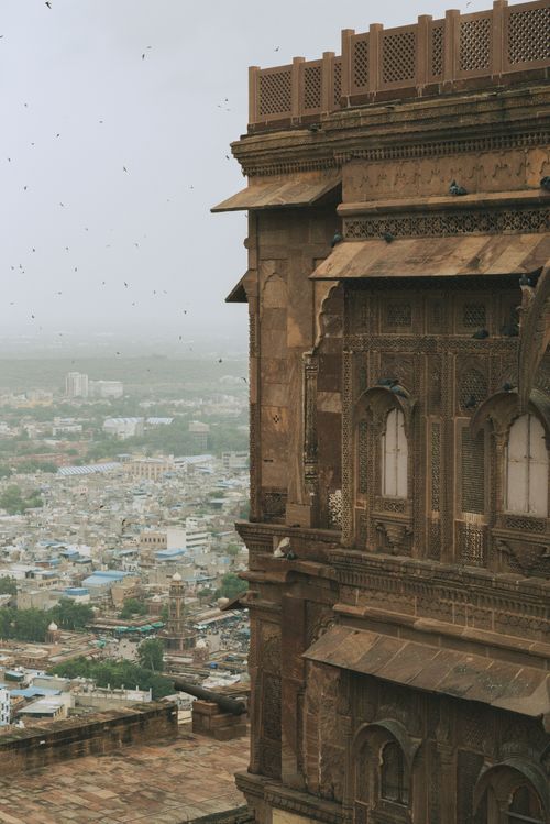 Free An ornate exterior of Mehrangarh Fort overlooking Jodhpur city, showcasing intricate carvings. Stock Photo