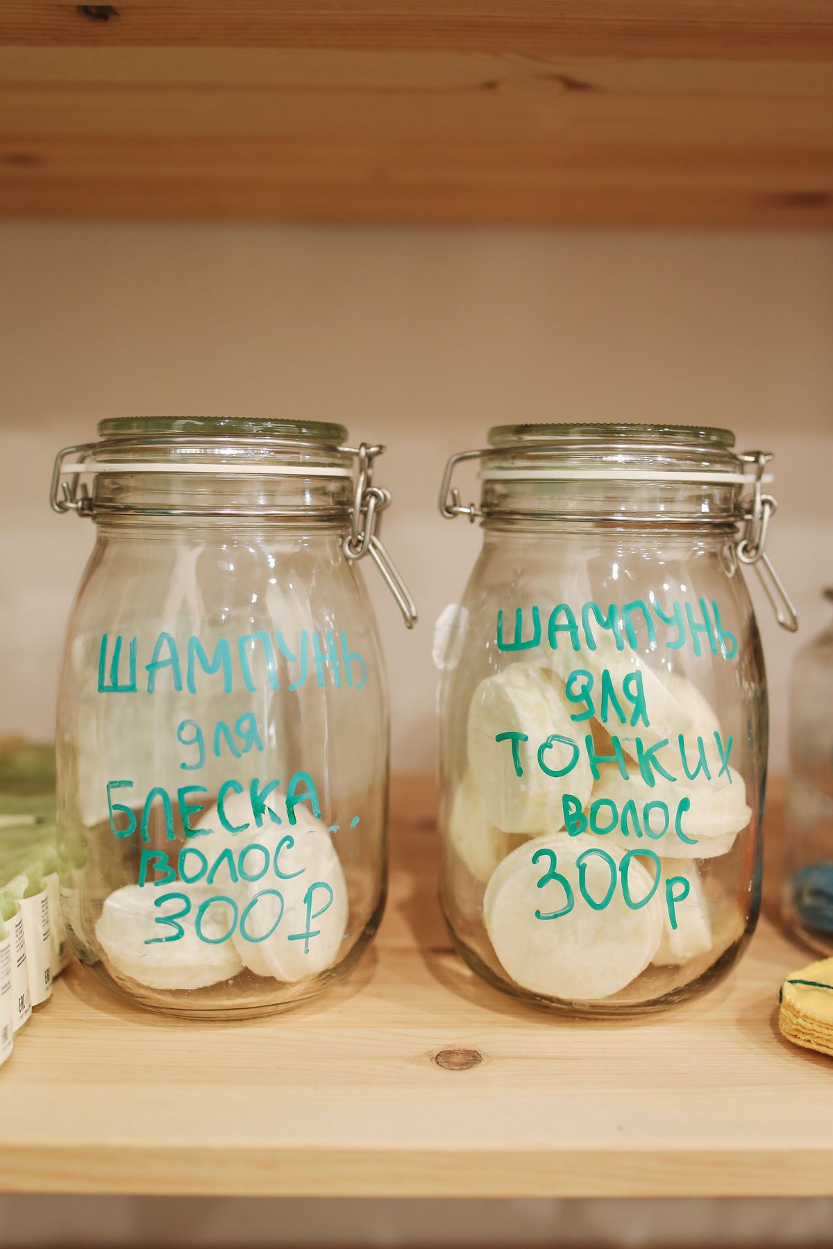 Assortment of fermented foods like kimchi, sauerkraut, yogurt, and pickles arranged on a table