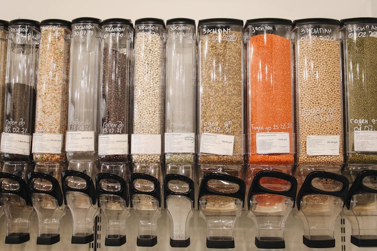 Variety Of Spices In Glass Dispensers