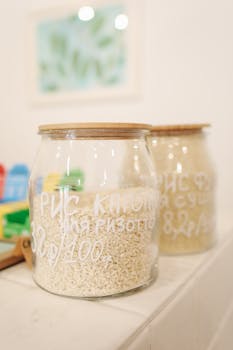 Eco-friendly glass jars filled with rice, promoting zero waste storage solutions.