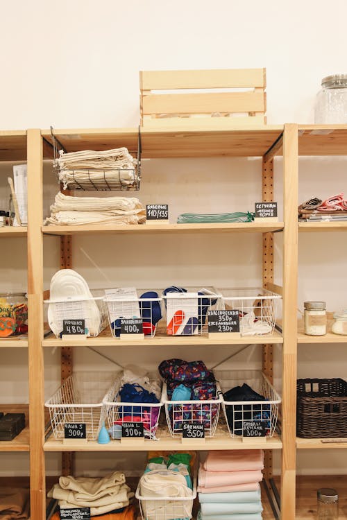Free Textiles on Wooden Shelf Stock Photo