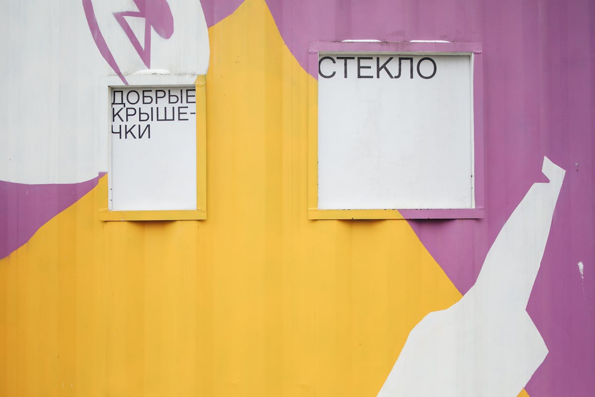 Barista pouring plant milk into a saucepan to warm it