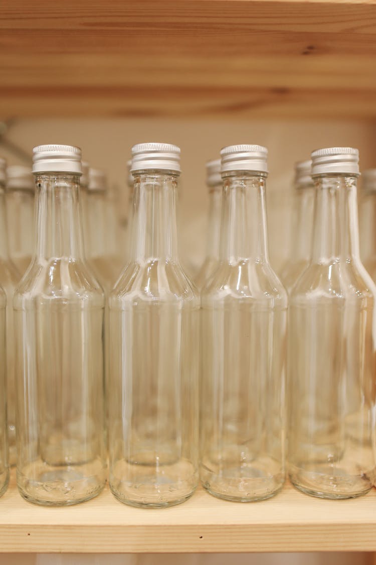 Glass Bottles On Shelf