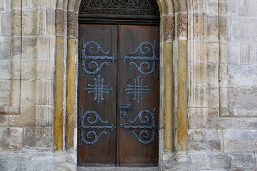 Free Beautifully detailed wooden door with ironwork in Schwäbisch Gmünd, Germany. Stock Photo