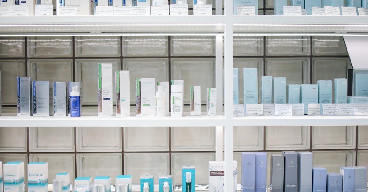 A clean and organized display of skincare products on shelves, perfect for beauty enthusiasts. A clean and organized display of skincare products on shelves, perfect for beauty enthusiasts.