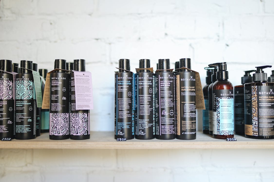 Free Shampoo Bottles on Shelf Stock Photo