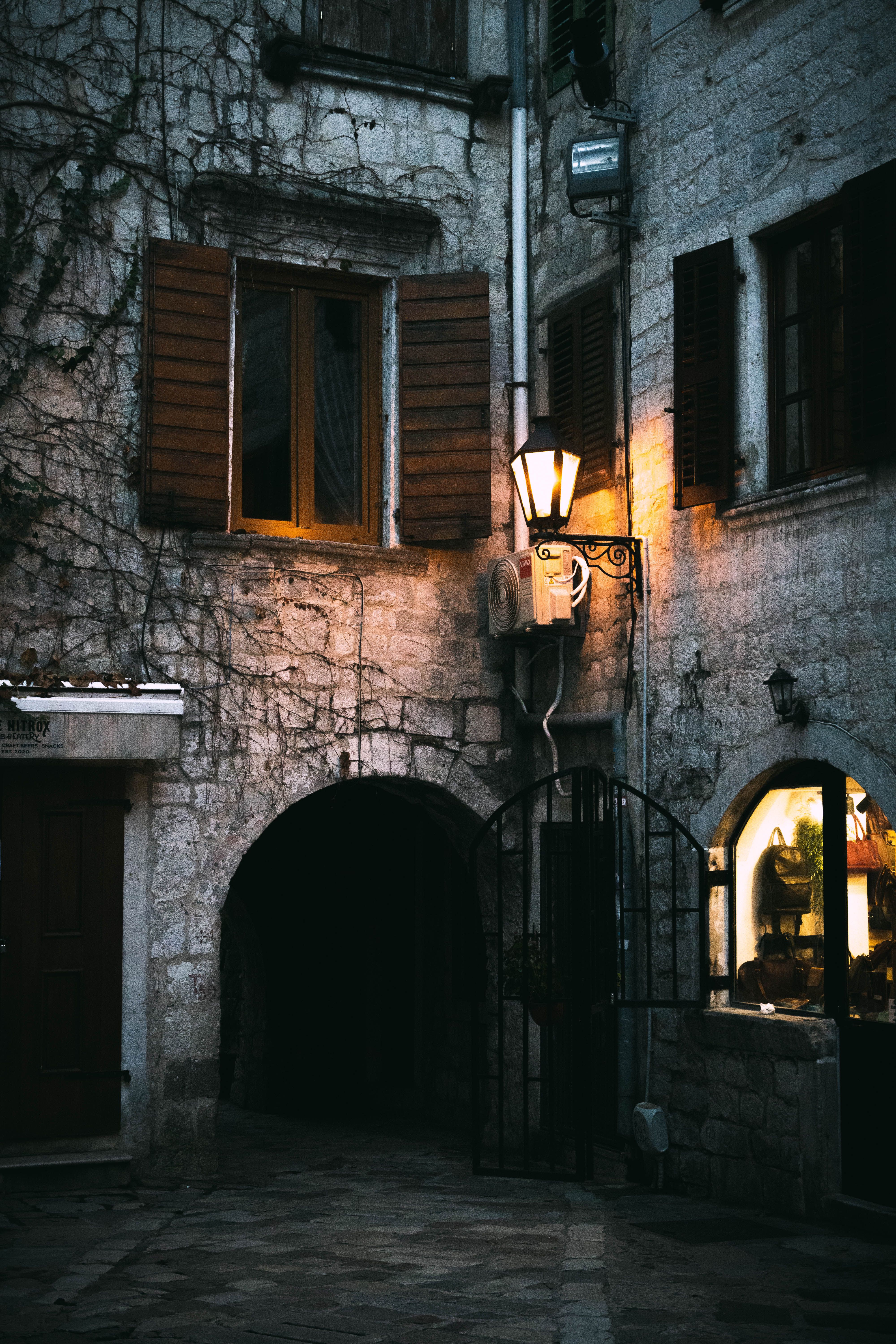 Charming Vintage Stone Alley at Night · Free Stock Photo