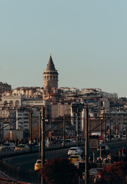 Free Istanbul's Galata Tower rises above the bustling cityscape under a clear blue sky. Stock Photo