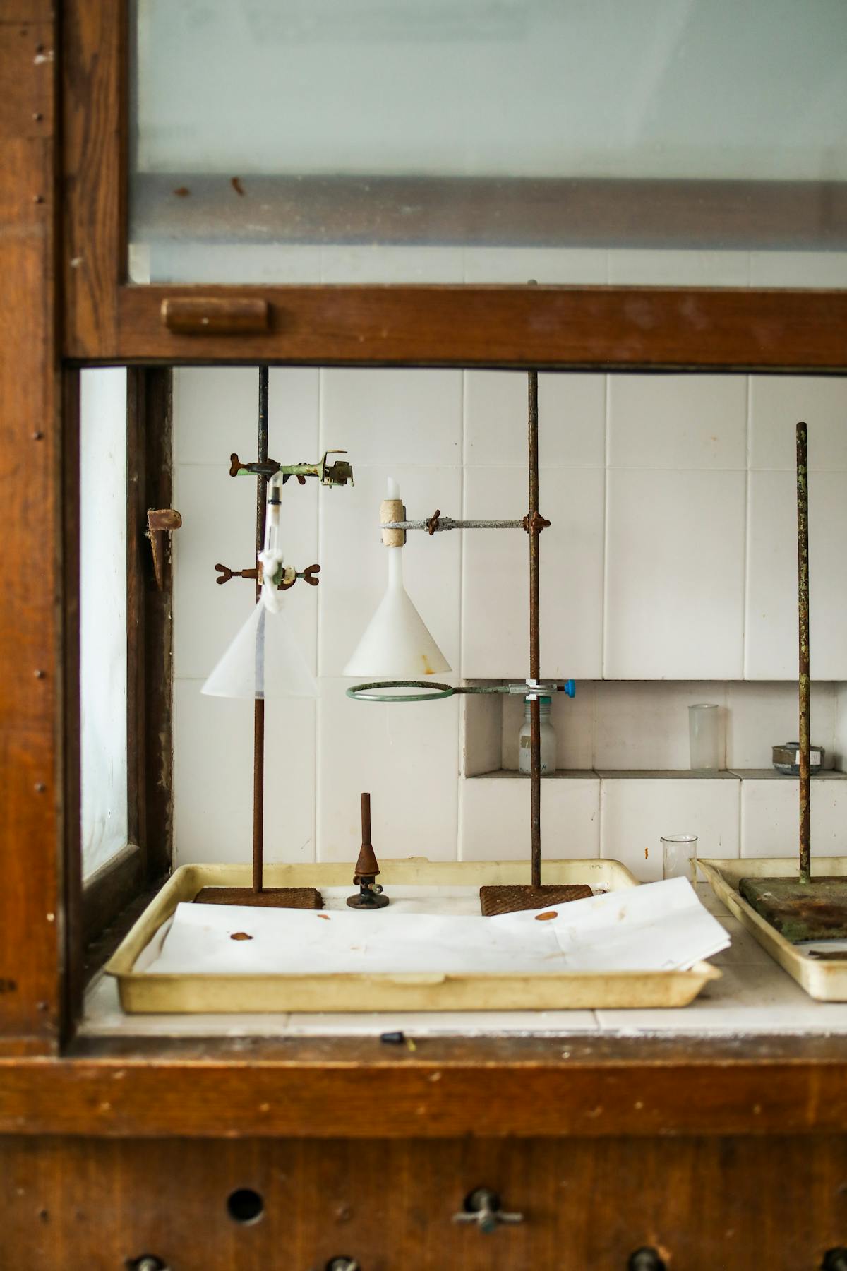 A doctor consulting with a patient while pointing at a digital tablet