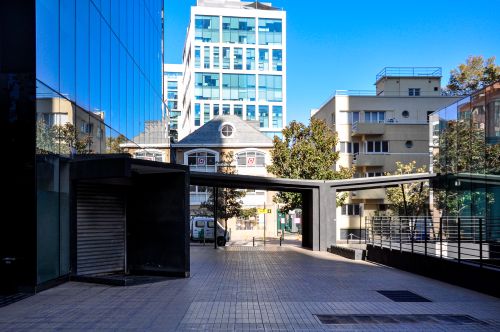 Free Contemporary buildings and urban landscape in Santiago, Chile, under clear blue skies. Stock Photo