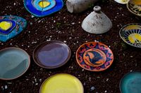 Painted ceramic plates, by Gizem Toprak on Pexels