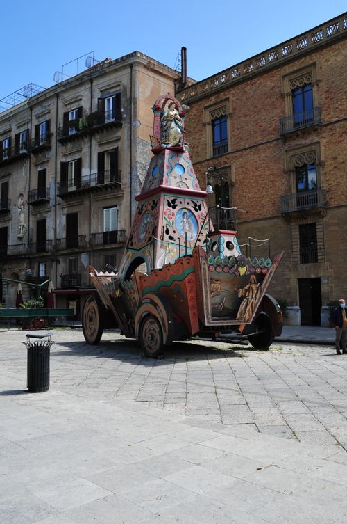 Free Vibrant traditional float in a charming historic piazza in Palermo. Stock Photo