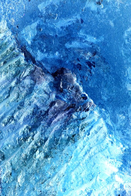 Free Abstract close-up of textured blue surface resembling an aerial ocean view, rich in texture and color. Stock Photo