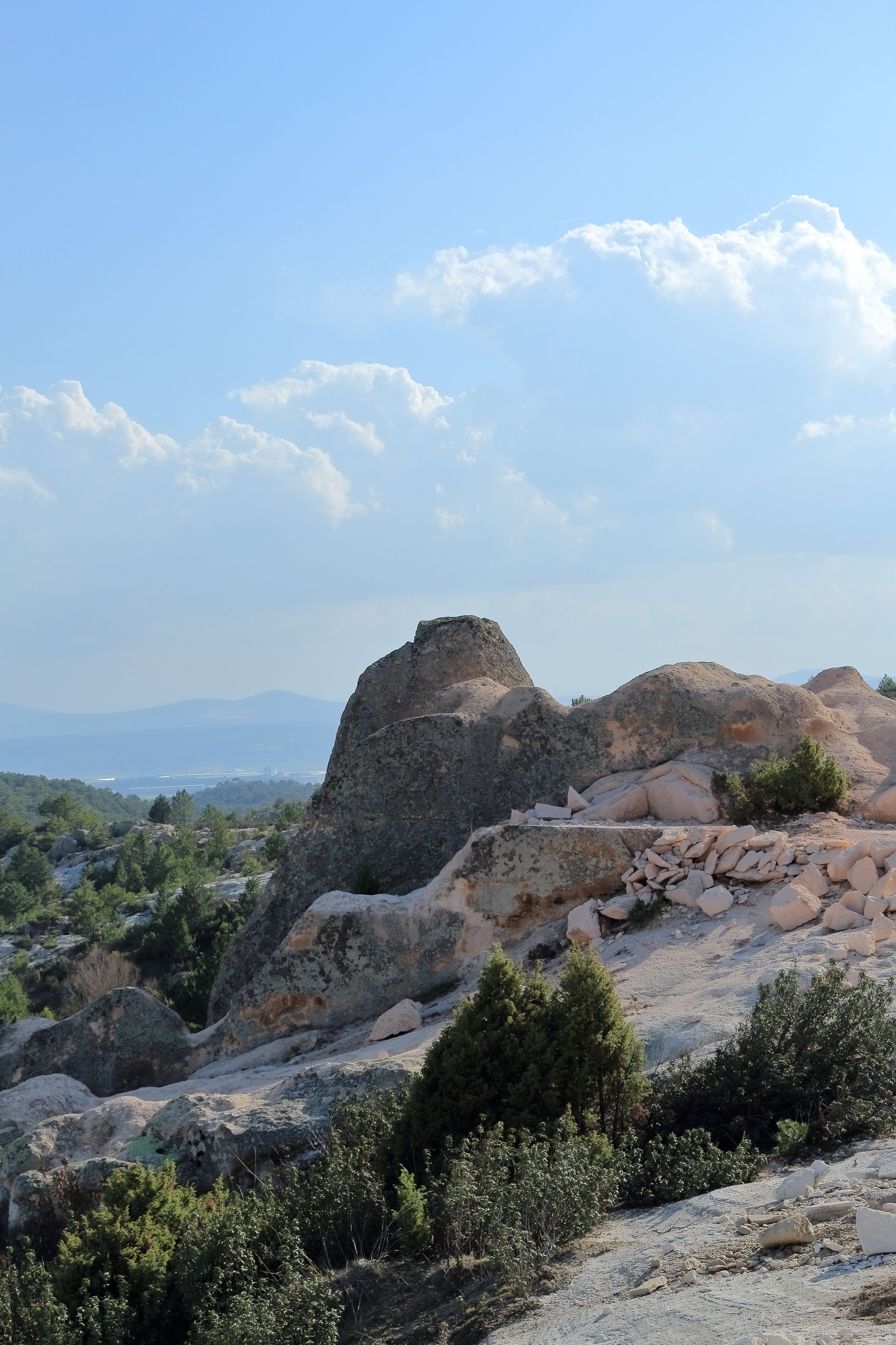 Breathtaking view of rocky formations under a clear blue sky. Ideal for nature and travel content.