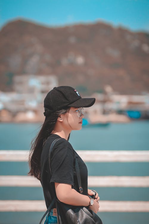 Woman Wearing Black Hat and Black Shirt