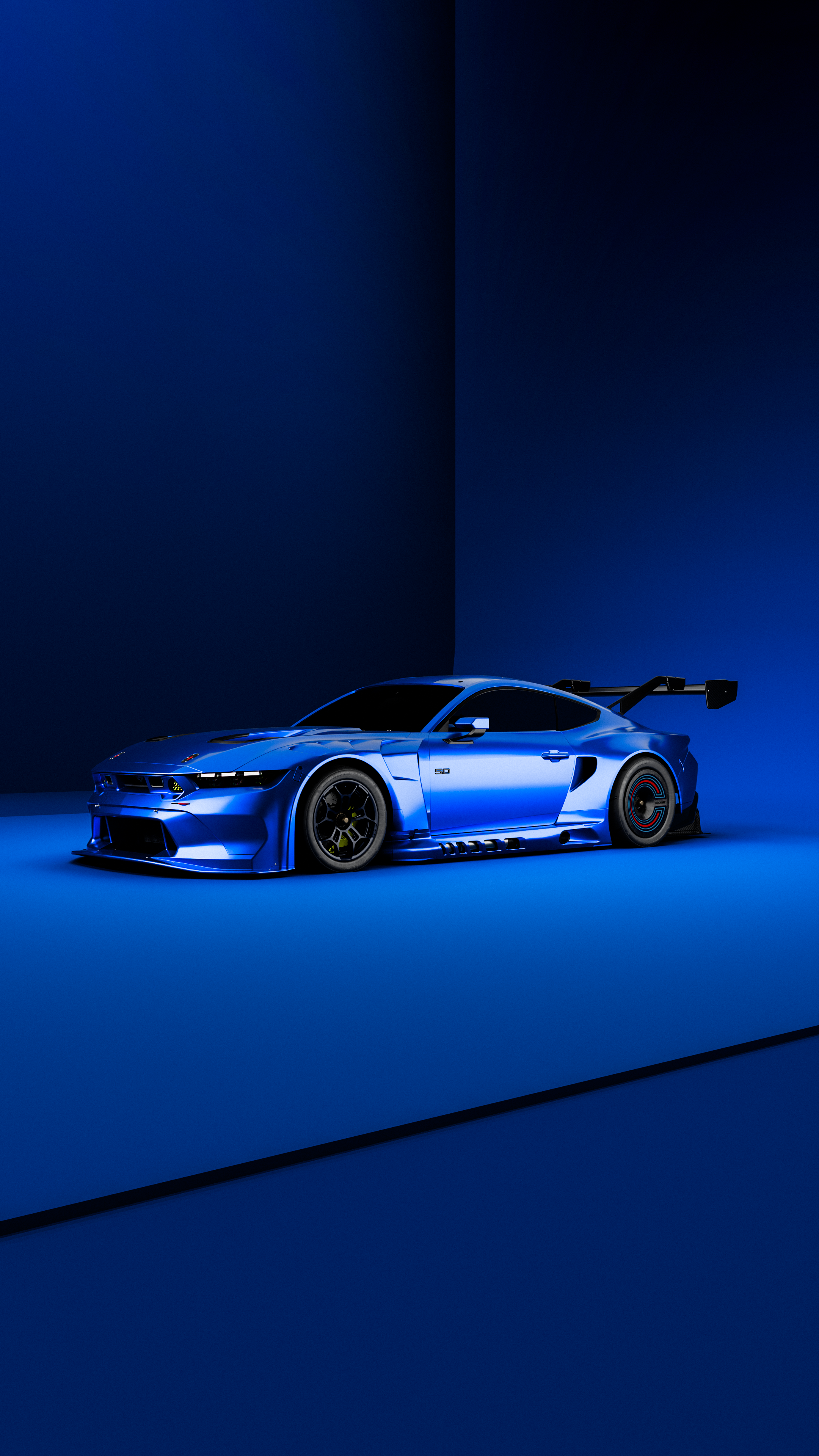 A high-performance blue sports car showcased in a sleek, modern indoor setting with dramatic lighting.