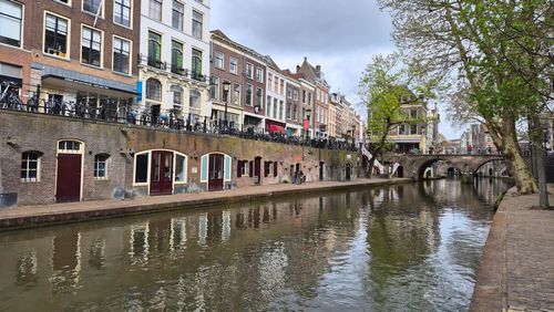 Free Charming canal scene with historic architecture in Utrecht, Netherlands. Stock Photo