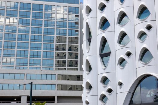 Sleek modern building facade in downtown Denver, reflecting urban design aesthetics.