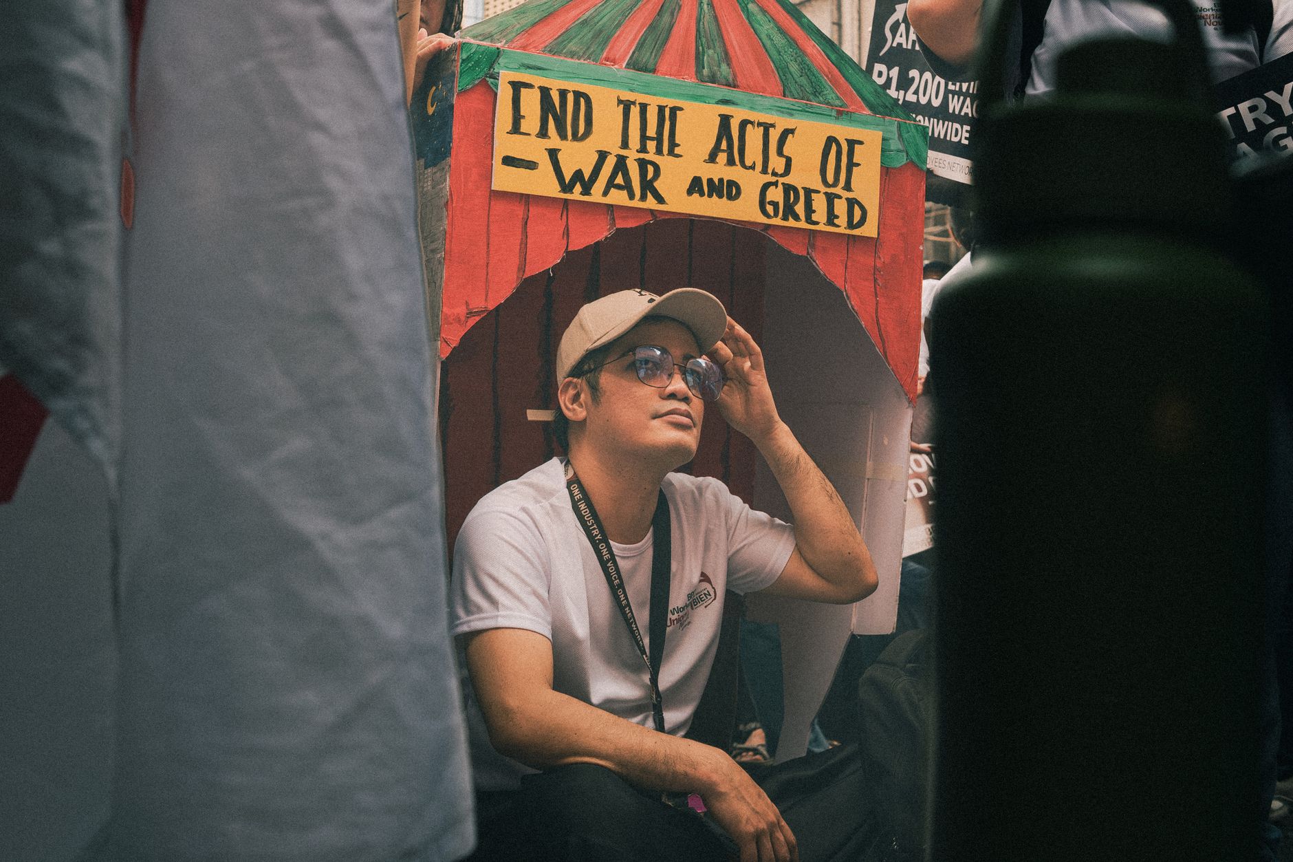 A man participates in a protest against war and greed in Metro Manila, Philippines.